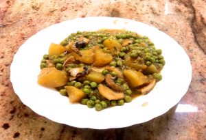 Sípia estofada amb pèsols i patates, recepta